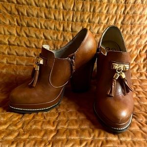 Brown platform booties by Seychelles in size 7.5M